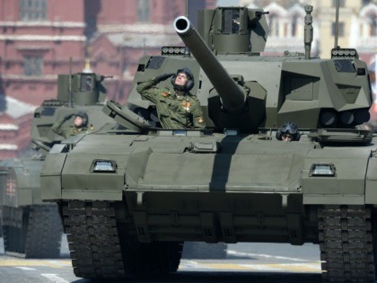 A Russian T 14 Armata battle tank rides through Red Square in Moscow, on May 7, 2015, during a rehearsal for the Victory Day military parade. Russia will celebrate the 70th anniversary of the 1945 victory over Nazi Germany on May 9. AFP PHOTO / YURI KADOBNOV (Photo credit should …