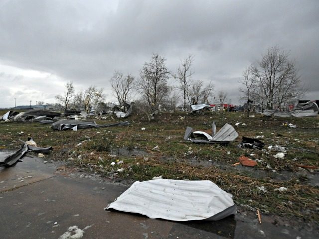 Debris is scatters on the ground on John Allison Drive after a tornado went through the ar