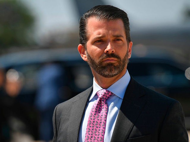 Donald Trump, Jr. looks on upon arrival at General Mitchell International Airport, with US President Donald Trump, in Milwaukee, Wisconsin on July 12, 2019. - Trump will be in Milwaukee to visit an aerospace company and attend a fundraiser. (Photo by MANDEL NGAN / AFP) (Photo by MANDEL NGAN/AFP via …