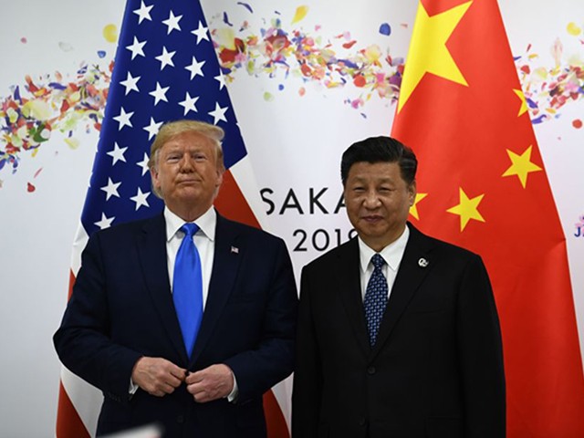 Chinese President Xi Jinping (R) and US President Donald Trump attend their bilateral meeting on the sidelines of the G20 Summit in Osaka on June 29, 2019. (Photo by Brendan Smialowski / AFP) (Photo credit should read BRENDAN SMIALOWSKI/AFP via Getty Images)