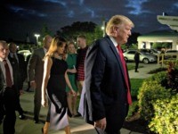 President Donald Trump and first lady Melania Trump arrive for Christmas Eve service at Family Church Downtown in West Palm Beach, Fla., Tuesday, Dec. 24, 2019. (AP Photo/Andrew Harnik)