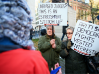 LONDON, ENGLAND - DECEMBER 05: Pro-Leave supporters argue with Pro-Remain supporters dressed as judges in front of the Supreme Court ahead of the first day of a hearing into whether Parliament's consent is required before the Brexit process can begin, on December 5, 2016 in London, England. The eleven Supreme …