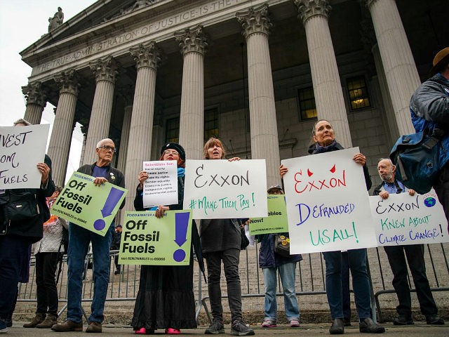 NEW YORK, NY - OCTOBER 22: Environmental activists rally for accountability for fossil fue