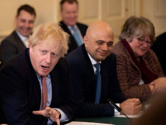 LONDON, UNITED KINGDOM - DECEMBER 17: Britain's Prime Minister Boris Johnson speaks during his first cabinet meeting since the general election, inside 10 Downing Street on December 17, 2019 in London, England. British Prime Minister Boris Johnson is holding the first cabinet meeting since winning a majority of 80 seats …