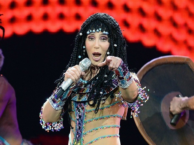 LAS VEGAS, NV - MAY 25: Singer Cher (C) performs with dancers at the MGM Grand Garden Aren
