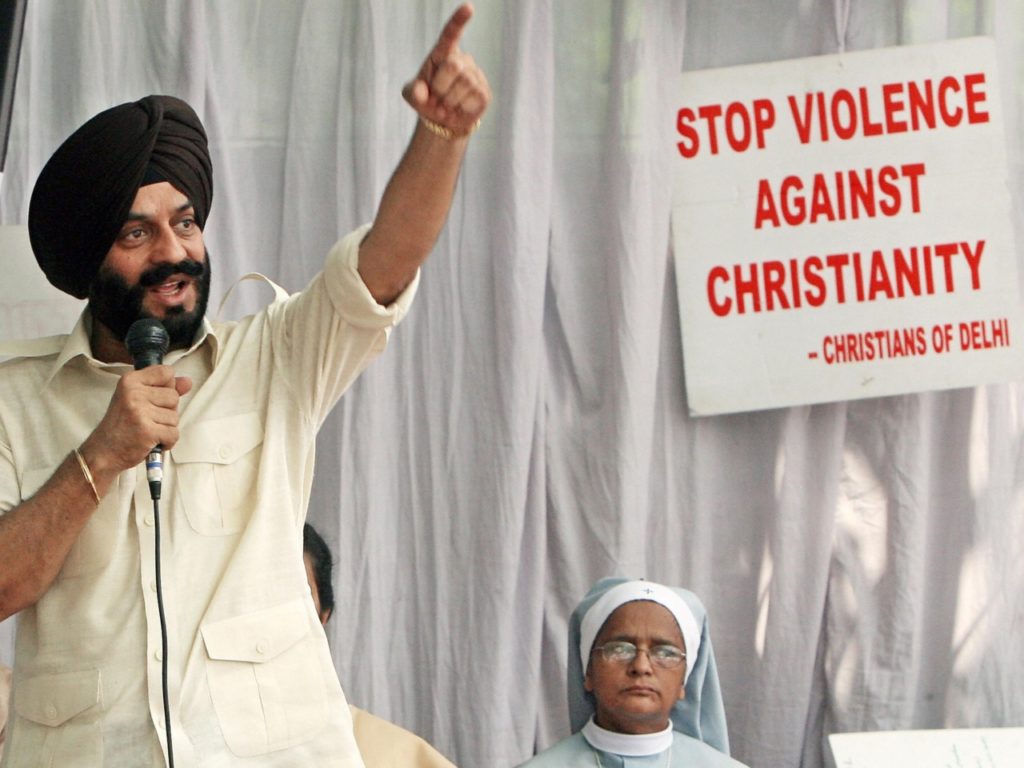 All India Anti-Terrorist Front (AIATF) President Maninder Singh Bitta (2L) gestures as he expresses his support for Indian Christians during a rally in New Delhi on Oct 1, 2008, to protest ongoing anti-Christian violence in the south Indian state of Karnataka and the eastern state of Orissa.  Christian leaders in India have called for the deployment of the president's government in the restless states.  About a dozen people have died in the Kandhamai region of Orissa and Karnatka since the death of Hindu priest and Vishwa Hindu Parishad (VHP) leader Swami Lakshananananda Saraswait and four others who were shot dead by unidentified assassins in Orissa in August.  Recent attacks on Christians in India have drawn condemnation from Pope Benedict XVI and the European Union.  Indian Prime Minister Manmohan Singh described the violence as a 