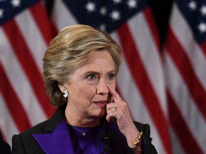 TOPSHOT - US Democratic presidential candidate Hillary Clinton pauses as she makes a concession speech after being defeated by Republican President-elect Donald Trump, in New York on November 9, 2016. / AFP / JEWEL SAMAD (Photo credit should read JEWEL SAMAD/AFP via Getty Images)