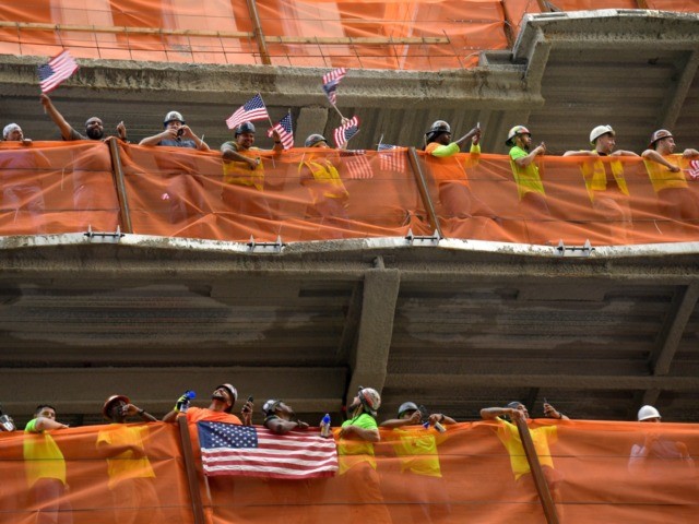 NEW YORK, NEW YORK - JULY 10: Construction workers cheer on he U.S. Women's National Soccer Team during their Victory Parade and City Hall Ceremony down the Canyon of Heroes on July 10, 2019 in New York City. (Photo by Michael Loccisano/Getty Images)