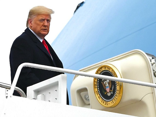 US President Donald Trump boards Air Force One as he departs Joint base Andrews in Marylan