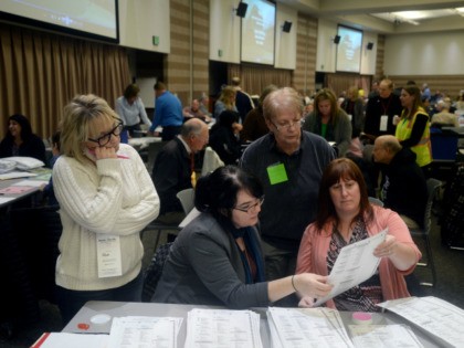 Lainie Smith, of Commerce, Aileen Dickson, City Clerk of Troy, Donna Glowacki, of Lake Orion, and Cheryl Stewart, of Troy, recount presidential ballots at the Oakland Schools Conference Center on December 5, 2016 in Waterford Township, Michigan. Recounts began in two Michigan counties today, after a federal judge ordered a …