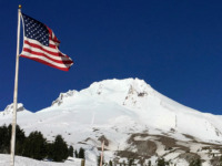 CORRECTS TO SOME PEOPLE, NOT GEOLOGIC EXPERTS IN THE SECOND SENTENCE - FILE - In this Feb. 13, 2018 file photo, Oregon's Mount Hood is seen from Timberline Lodge on the south side of the mountain. The 2018 eruption of the Kilauea volcano in Hawaii has some people along the …