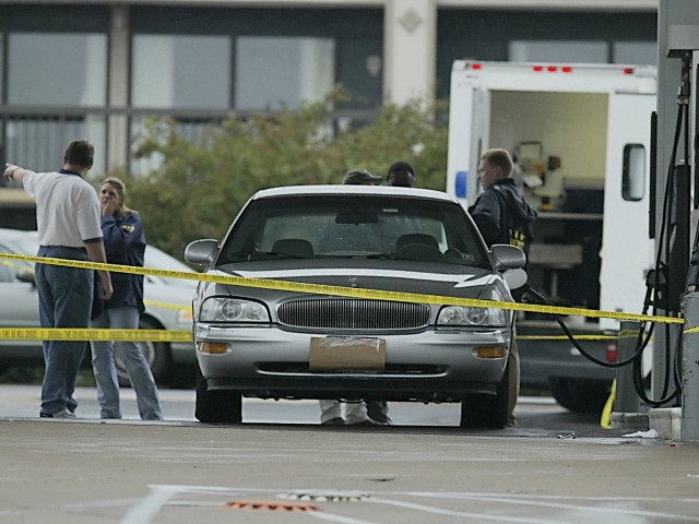 The car of an unidentified man who was shot while he pumped gas in Massaponax, Virginia, s