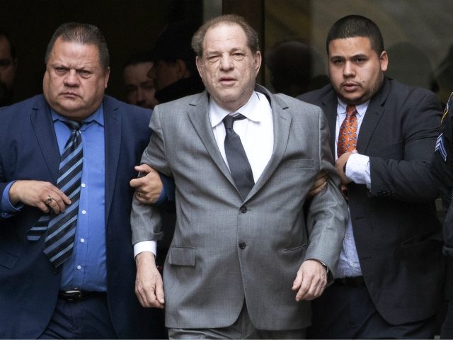 Harvey Weinstein, center, leaves court following a bail hearing, Friday, Dec. 6, 2019 in New York. (AP Photo/Mark Lennihan)