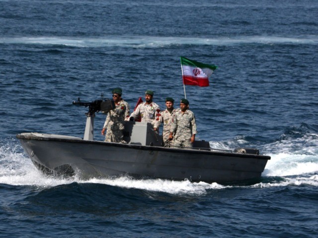 Iranian soldiers take part in the "National Persian Gulf day" in the Strait of Hormuz, on April 30, 2019. - The date coincides with the anniversary of a successful military campaign by Shah Abbas the Great of Persia in the 17th century, which drove the Portuguese navy out of the …