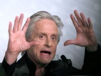 US actor Michael Douglas gestures on May 21, 2013 while talking during a press conference for the film "Behind the Candelabra" presented in Competition at the 66th edition of the Cannes Film Festival in Cannes. Cannes, one of the world's top film festivals, opened on May 15 and will climax …