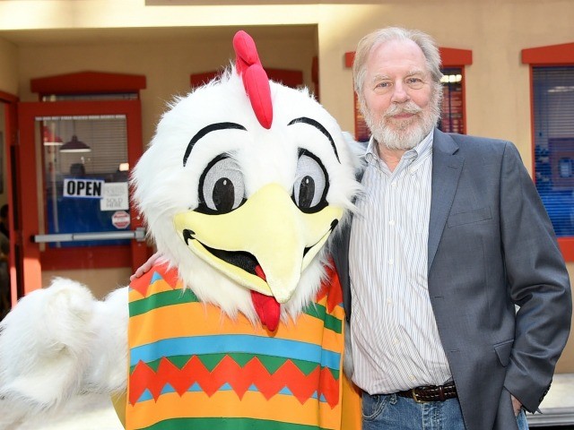 NEW YORK, NY - APRIL 10: Actor Michael McKean poses with the Los Pollos Hermanos mascot at