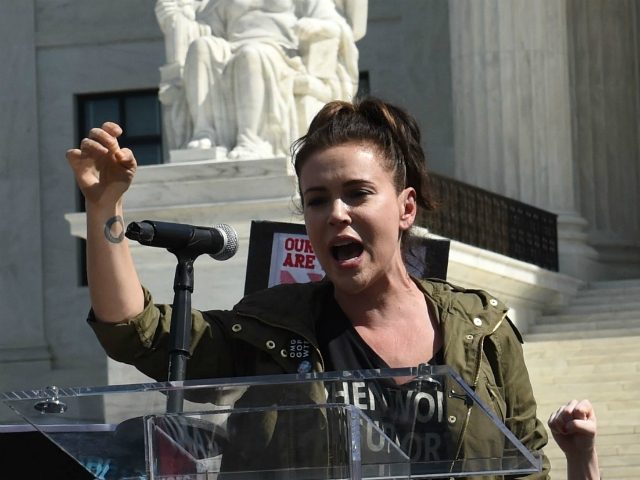 Actress Alyssa Milano speaks as activist demonstrate against US Supreme Court nominee Bret