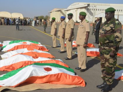 Personnel of the Niger Military pay tribute to the military personnel, that was killed in an attack, at the funeral prayer at the Niamey Airforce Base in Niamey, on December 13, 2019. - 71 Military personnel died in an attack on a military camp in Inates in the western Tillaberi …