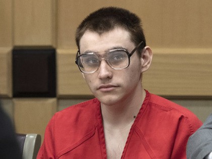 Florida school shooting defendant Nikolas Cruz appears in Judge Elizabeth Scherer's courtroom at the Broward Courthouse, Thursday, Dec. 19, 2019, in Fort Lauderdale, Fla. The trial of Parkland school shooting defendant Nikolas Cruz was delayed Thursday until at least next summer, when he will face a death penalty case stemming …