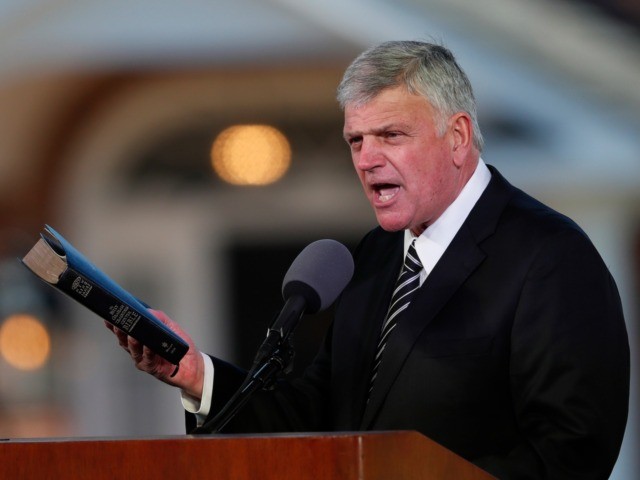 In this March 2, 2018 file photo, Pastor Franklin Graham speaks during a funeral service at the Billy Graham Library for the Rev. Billy Graham, who died last week at age 99 in Charlotte, N.C. Graham has denounced the impeachment investigation of President Donald Trump, but this week asked followers …