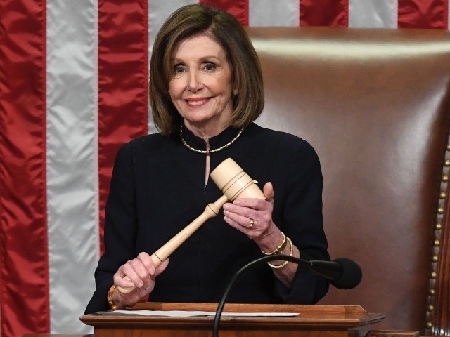 US Speaker of the House Nancy Pelosi presides over Resolution 755, Articles of Impeachment Against President Donald J. Trump as the House votes at the US Capitol in Washington, DC, on December 18, 2019. - The US House of Representatives voted 229-198 on Wednesday to impeach President Donald Trump for …