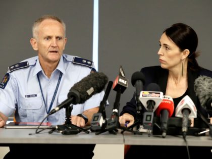 New Zealand Prime Minister Jacinda Ardern watches as police Superintendent Bruce Bird, left, addresses a press conference in Whakatane, New Zealand, Tuesday, Dec. 10, 2019. A volcanic island in New Zealand erupted Monday Dec. 9 in a tower of ash and steam while dozens of tourists were exploring the moon-like …