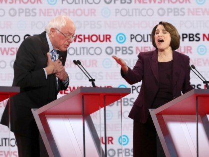 Democratic presidential candidate Sen. Bernie Sanders (I-VT) reacts to Sen. Amy Klobuchar (D-MN) during the Democratic presidential primary debate at Loyola Marymount University on December 19, 2019 in Los Angeles, California. Seven candidates out of the crowded field qualified for the 6th and last Democratic presidential primary debate of 2019 …