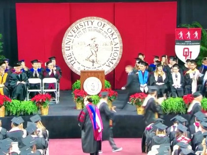 Nathaniel Beale’s ten-year-old son, Noah, took his place at his University of Oklahoma graduation on Saturday.