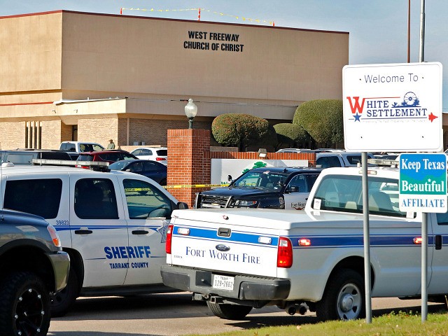 WHITE SETTLEMENT, TX - DECEMBER 29: Law enforcement vehicles are parked outside West Freeway Church of Christ where a shooting took place at the morning service on December 29, 2019 in White Settlement, Texas. The gunman was killed by armed members of the church after he opened fire during Sunday …