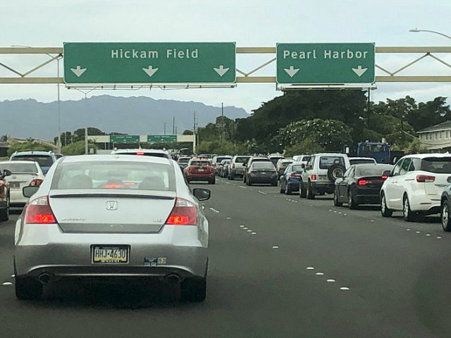 Traffic backs up at the main gates after a shooting at Pearl Harbor Naval shipyard, Wednes