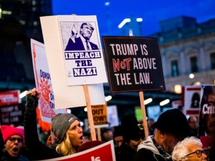 Protestors march during a demonstration in part of a national impeachment rally, at the Fe