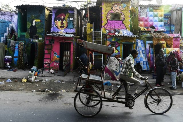 Rainbow murals bring some cheer to Delhi slum