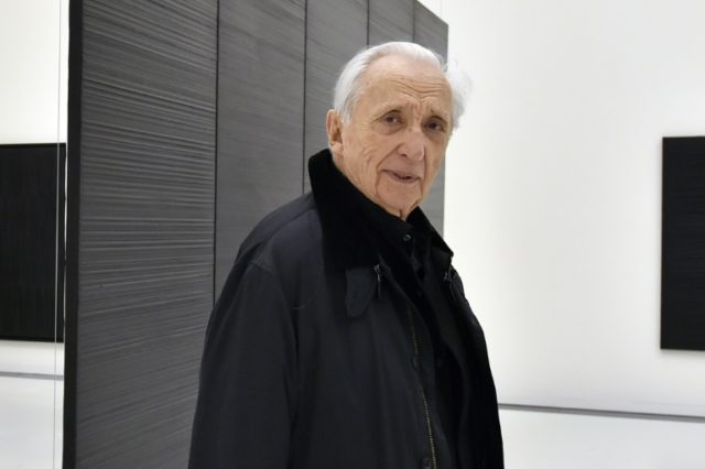 Art's man in black gets Louvre tribute for 100th birthday