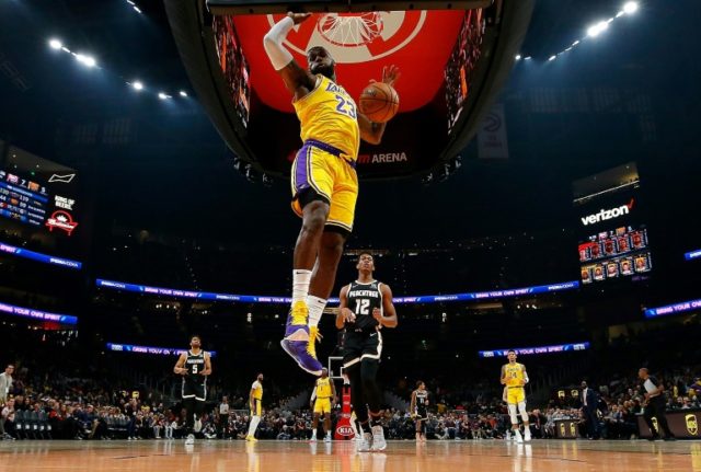 Los Angeles LeBron James dunks against the host Atlanta Hawks in the first half of the Lakers 101-96 win NBA season becomes a family affair for LeBron James