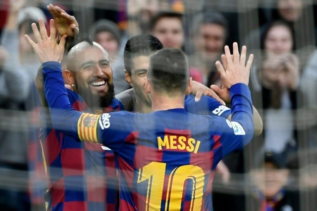 Messi sparkles in Barcelona Christmas stroll