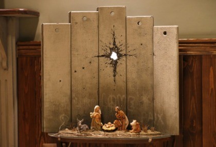 Mysterious artist Banksy unveils dark nativity in Bethlehem