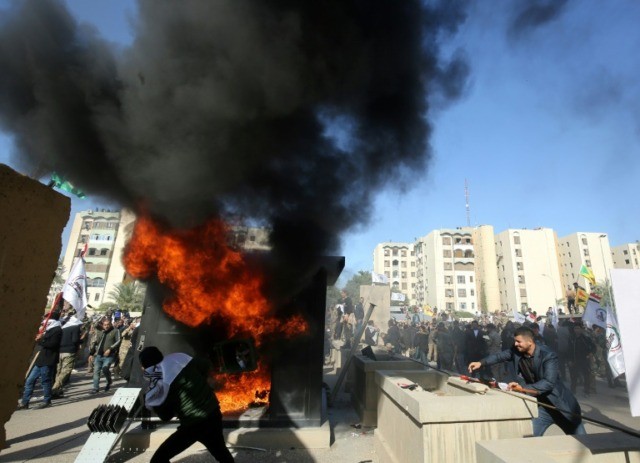 Pro-Iran protesters attack US embassy over deadly Iraq strikes