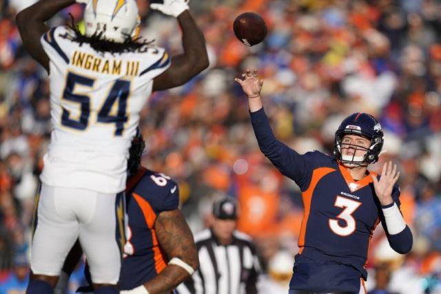 Chargers Broncos Football Denver Broncos quarterback Drew Lock passes under pressure form Los Angeles Chargers defensive end Melvin Ingram during the first half of an NFL football game Sunday, Dec. 1, 2019, in Denver. (AP Photo/Jack Dempsey) The Associated Press