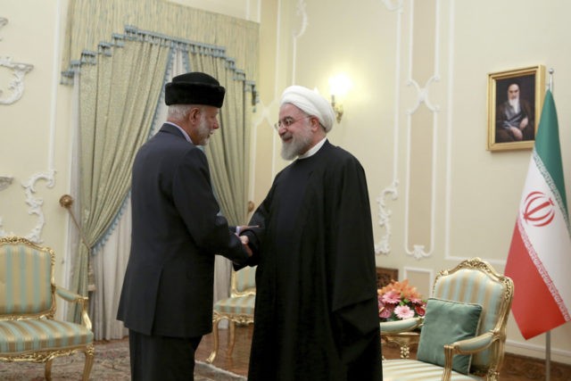 Iran Oman Hassan Rouhani, Yusuf bin Alawi In this photo released by the official website of the office of the Iranian Presidency, President Hassan Rouhani, right, shakes hands with Omani Minister of State for Foreign Affairs Yusuf bin Alawi at the start of their meeting, in Tehran, Iran, Tuesday, Dec. 3, 2019 (Office of the Iranian Presidency via AP) The Associated Press