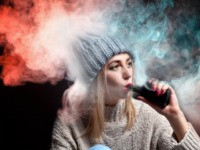 young woman vaping