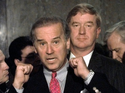 Sen. Joseph Biden, D-Del., left, gestures toward William Weld, President Clinton's choice