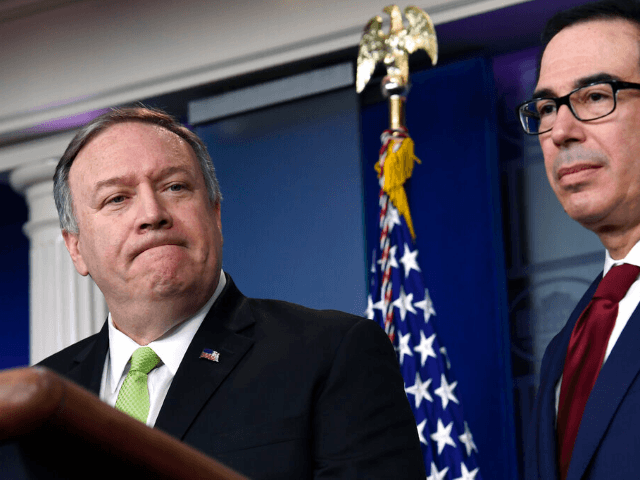 Treasury Secretary Steven Mnuchin, right, and Secretary of State Mike Pompeo, left, participate in a briefing at the White House in Washington, Friday, Jan. 10, 2020. (AP Photo/Susan Walsh)