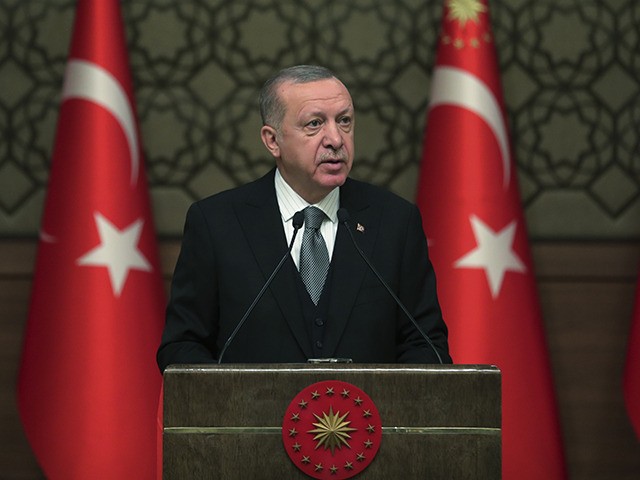 Turkey's President Recep Tayyip Erdogan deliver a speech at an event in Ankara, Turkey, Thursday, Jan. 2, 2020. Turkey's parliament on Thursday authorised the deployment of troops to Libya to support the U.N.-backed government in Tripoli battle forces loyal to a rival government that is seeking to capture the capital. …