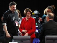 Democratic presidential candidate Sen. Amy Klobuchar, D-Minn., prepares to be interviewed in the spin room Tuesday, Jan. 14, 2020, after a Democratic presidential primary debate hosted by CNN and the Des Moines Register in Des Moines, Iowa. (AP Photo/Charlie Neibergall)