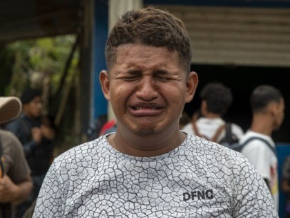 A teenage Honduran migrant traveling in a group of migrants cries as is he deported by Guatemalan police in Morales, Guatemala, Thursday, Jan. 16, 2020. Less-organized migrants, tighter immigration control by Guatemalan authorities and the presence of U.S. advisers have reduced the likelihood that the hundreds of migrants who departed …