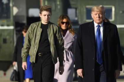 President Donald Trump, first lady Melania Trump and their son Barron Trump walk toward Air Force One at Andrews Air Force Base in Md., Friday, Jan. 17, 2020. The Trumps are heading to Florida to spend the weekend at their Mar-a-Lago estate. (AP Photo/Susan Walsh)