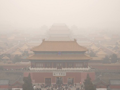 Tourists exit the Forbidden City in Beijing, Saturday, Jan. 18, 2020. A Chinese woman sparked social media outrage in her country by posting photos of herself and a friend with a Mercedes-Benz SUV on the grounds of Beijing's landmark Forbidden City, prompting an apology from the management of China's former …