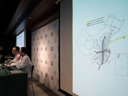 A screen shows a map of the Wuhan transportation in China as Professor Gabriel Leung, Founding Director of the WHO Collaborating Centre for Infectious Disease Epidemiology and Control, left, and Professor Joseph Wu, Division of Epidemiology and Biostatistics, School of Public Health, HKUMed, attend a news conference on the Wuhan …