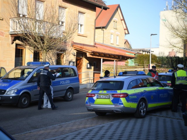 Police at the scene after shots were fired in Rot Am See, Germany, Friday, Jan. 24, 2020.