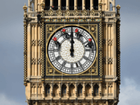Technicians carry out cleaning and maintenance work on one of the faces of the Great Clock atop the landmark Elizabeth Tower that houses Big Ben, attached to the Houses of Parliament, in London, on August 19, 2014. A team of abseilers is busy this week cleaning up the clock faces …